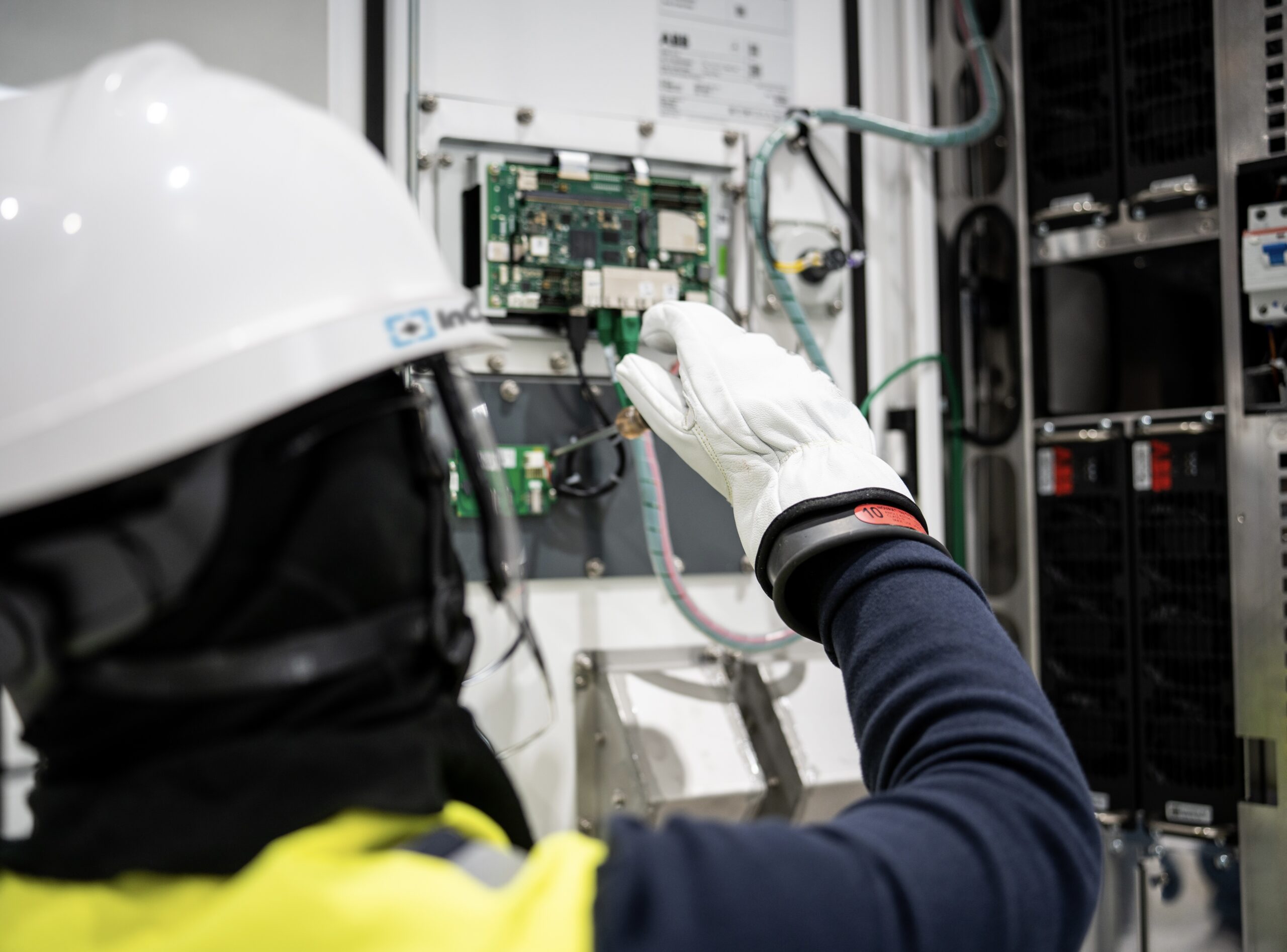 Closeup of technician fixing charger